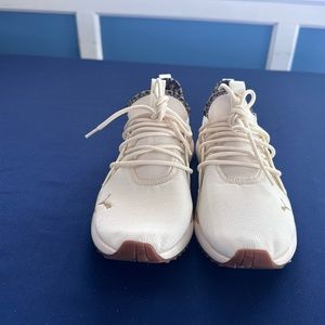 Used Puma Cream cheetah sneakers women size 9.5